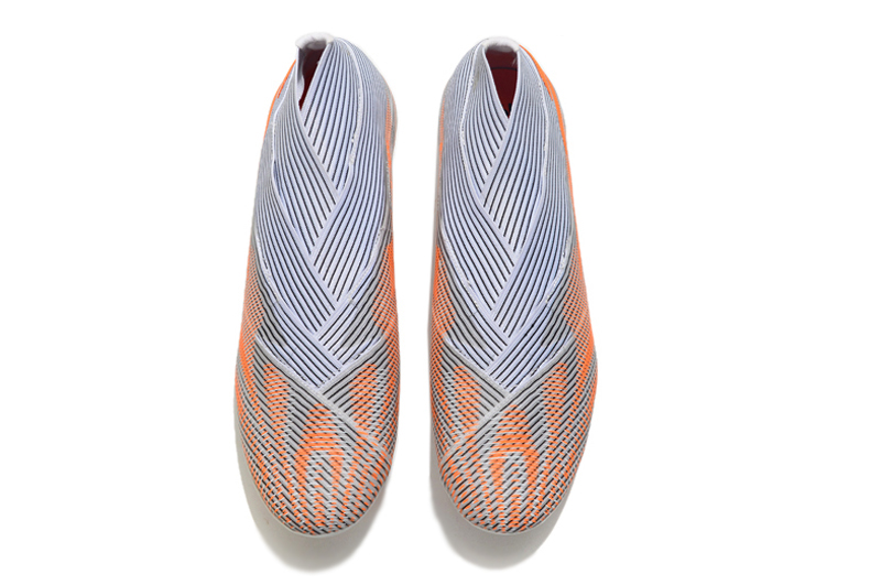 Adidas Nemeziz+ Solar Red Solar Yellow Core Black FG - Enhanced Performance and Style at Its Best