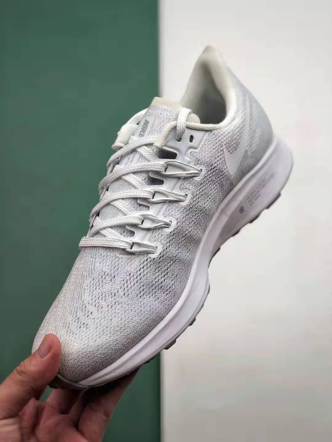 Nike Air Zoom Pegasus 36 Triple White AQ2203 100 - Lightweight Comfort and Style for Runners Nike Air Zoom Pegasus 36 Triple White AQ2203 100 - Lightweight Comfort and Style for Runners