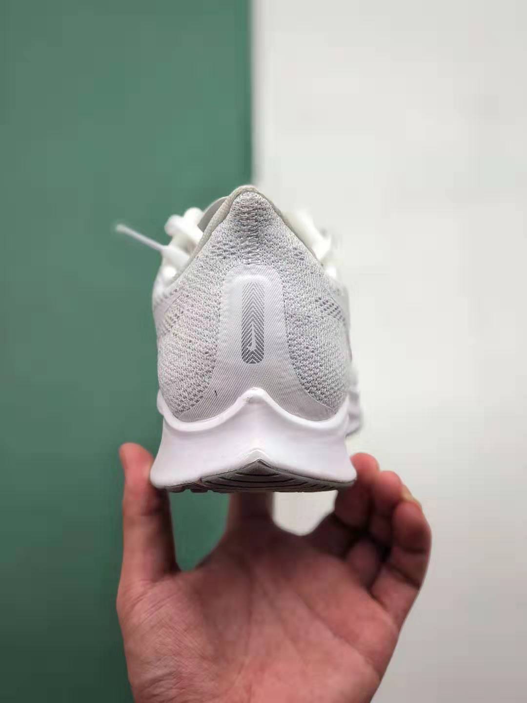 Nike Air Zoom Pegasus 36 Triple White AQ2203 100 - Lightweight Comfort and Style for Runners Nike Air Zoom Pegasus 36 Triple White AQ2203 100 - Lightweight Comfort and Style for Runners