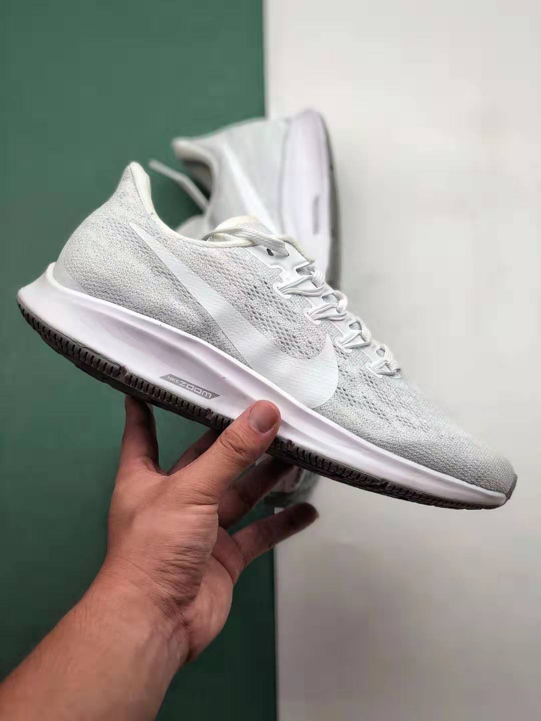 Nike Air Zoom Pegasus 36 Triple White AQ2203 100 - Lightweight Comfort and Style for Runners Nike Air Zoom Pegasus 36 Triple White AQ2203 100 - Lightweight Comfort and Style for Runners