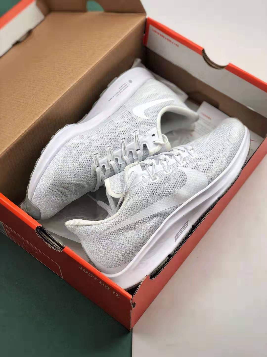 Nike Air Zoom Pegasus 36 Triple White AQ2203 100 - Lightweight Comfort and Style for Runners Nike Air Zoom Pegasus 36 Triple White AQ2203 100 - Lightweight Comfort and Style for Runners