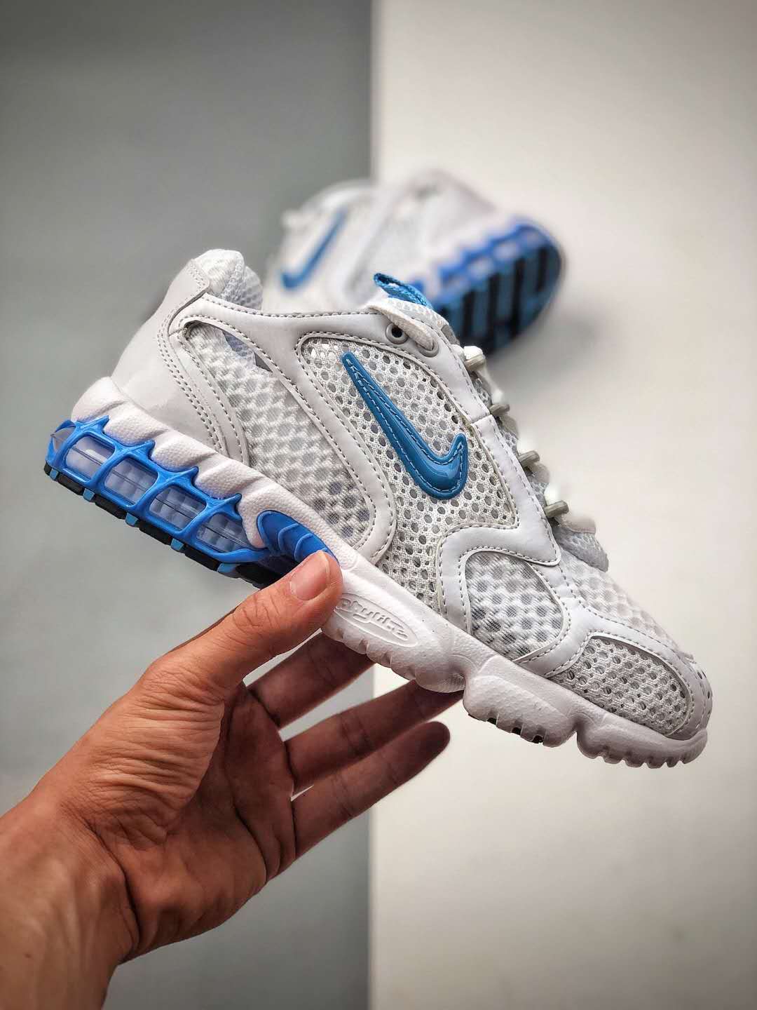 Nike Air Zoom Spiridon Cage 2 'White University Blue' CD3613-100 - Stylish and Comfortable Sneakers for Men Nike Air Zoom Spiridon Cage 2 'White University Blue' CD3613-100 - Stylish and Comfortable Sneakers for Men