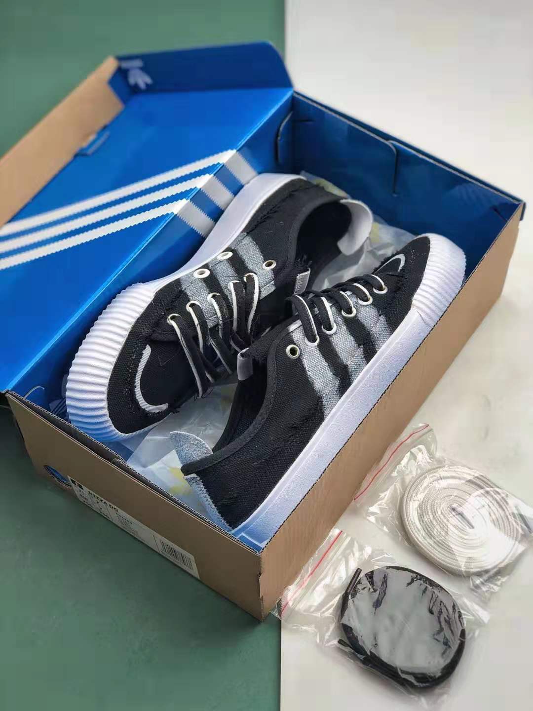 Donald Glover x Adidas Nizza Black - Sleek and Stylish Fashion Collaboration Donald Glover x Adidas Nizza Black - Sleek and Stylish Fashion Collaboration