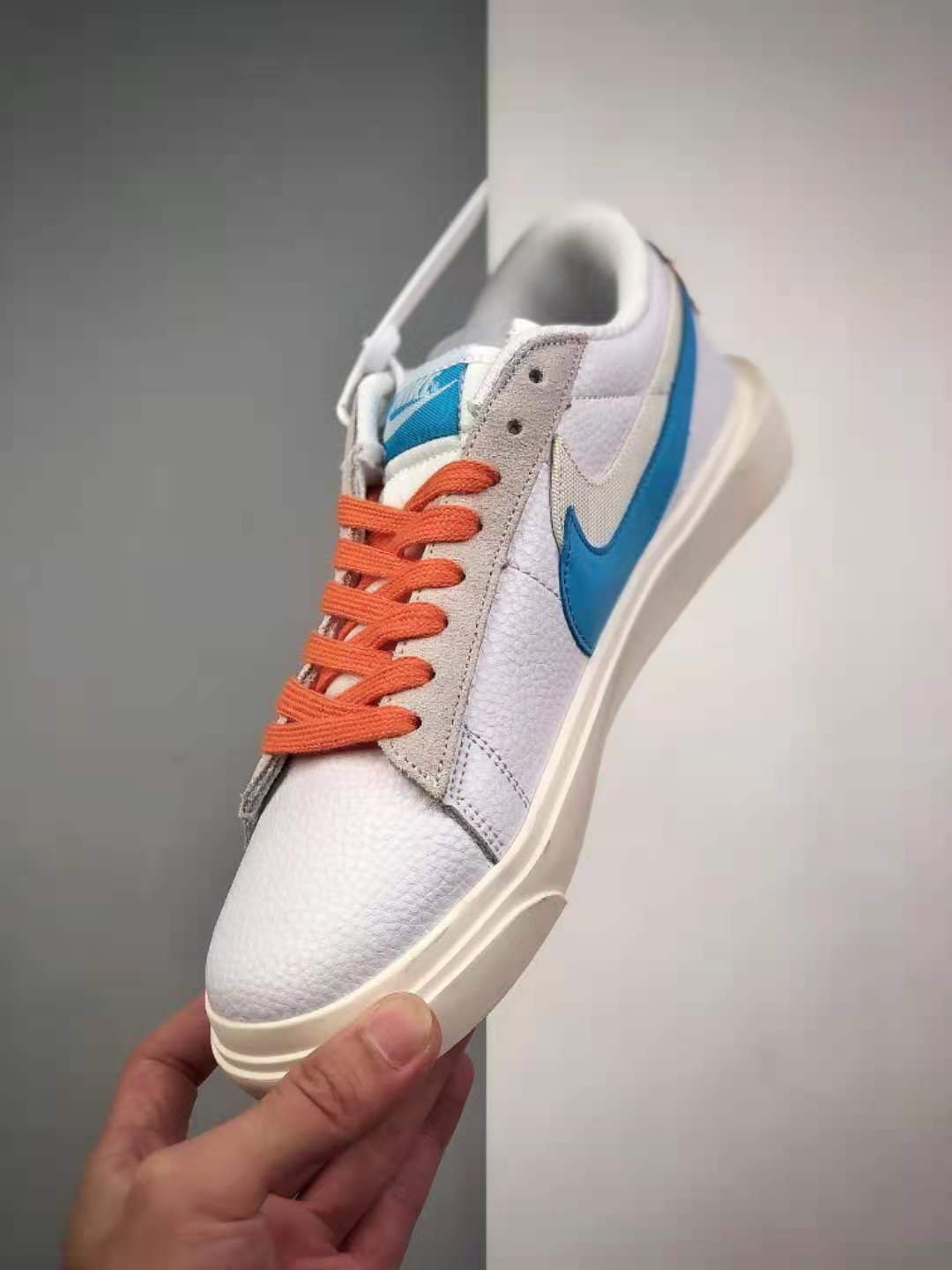 Sacai x Nike SB Blazer Low: White Blue Orange Shoes BV0076-104 | Limited Edition Collaboration