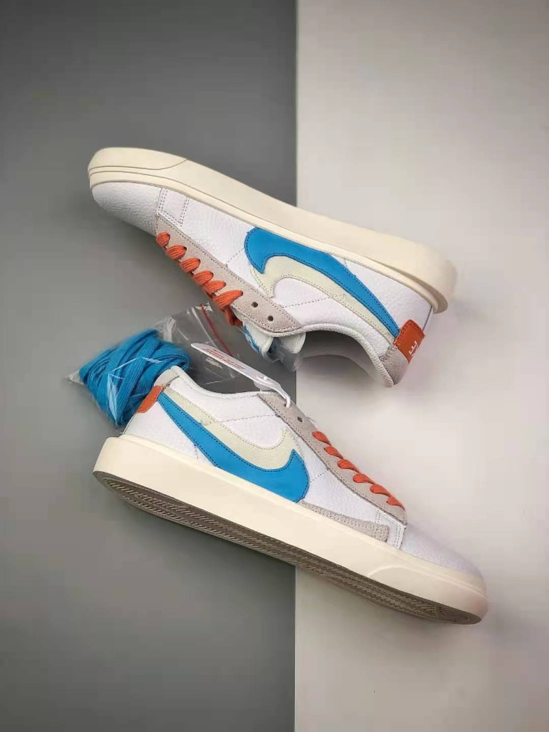 Sacai x Nike SB Blazer Low: White Blue Orange Shoes BV0076-104 | Limited Edition Collaboration
